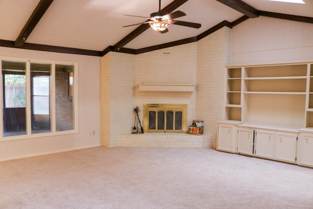 unfurnished living room with light carpet, vaulted ceiling with beams, a fireplace, and ceiling fan