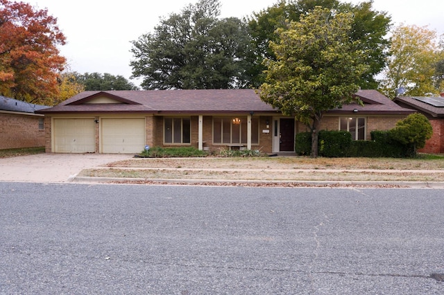 single story home with a garage