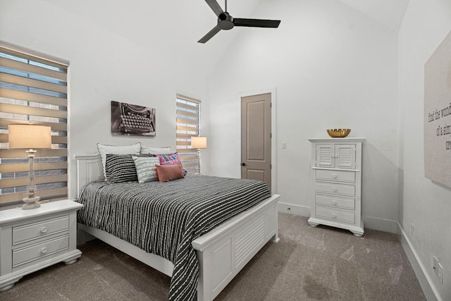 bedroom with ceiling fan, high vaulted ceiling, and dark colored carpet