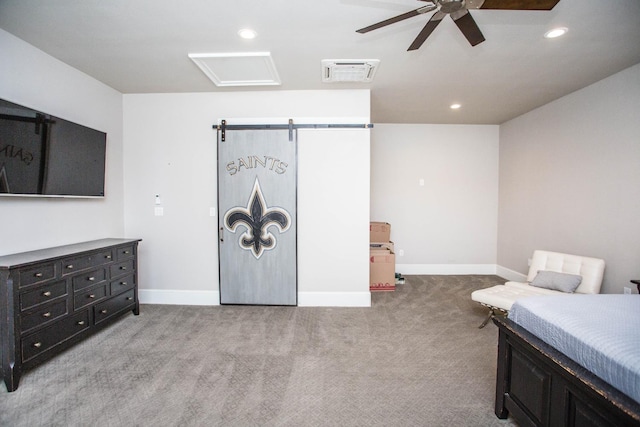 bedroom with light carpet, attic access, visible vents, baseboards, and recessed lighting