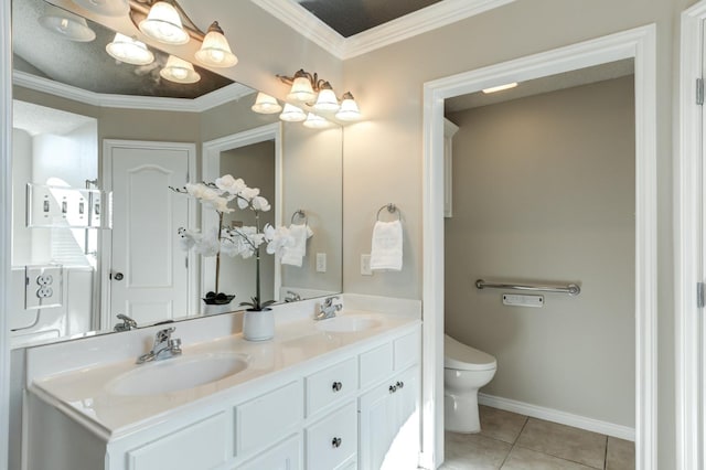 bathroom featuring tile patterned flooring, ornamental molding, vanity, and toilet