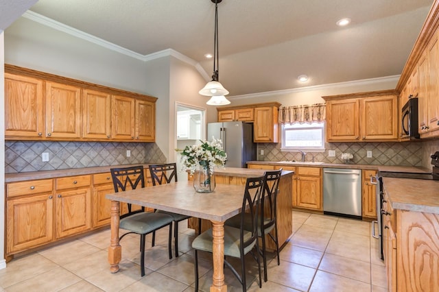 kitchen featuring sink, crown molding, hanging light fixtures, light tile patterned floors, and stainless steel appliances