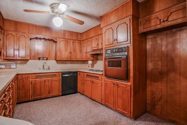 kitchen featuring sink, black dishwasher, wall oven, white gas stovetop, and a textured ceiling