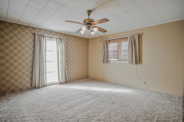 carpeted empty room with ceiling fan