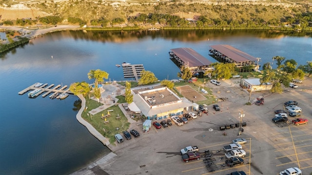 birds eye view of property featuring a water view