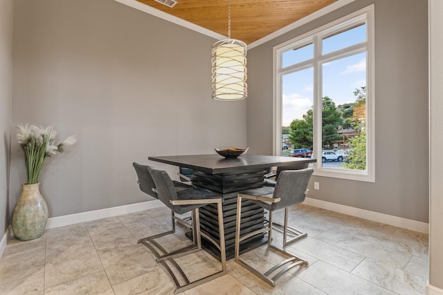 dining space featuring crown molding, wood ceiling, and light tile patterned flooring