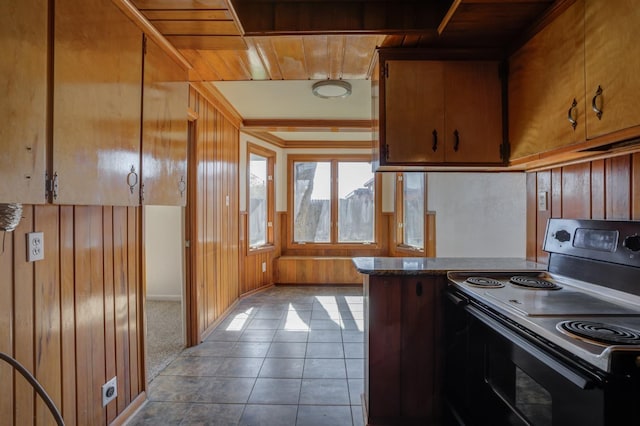 kitchen with black / electric stove, wood ceiling, wooden walls, and light tile patterned floors