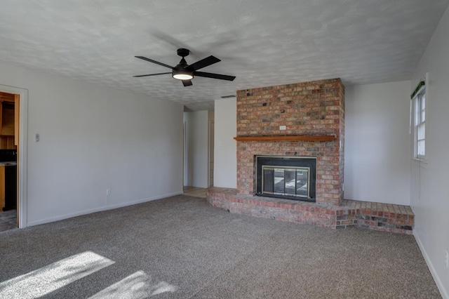 unfurnished living room featuring a textured ceiling and carpet