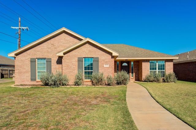 ranch-style home with a front yard