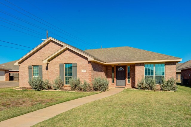 ranch-style house with a front yard