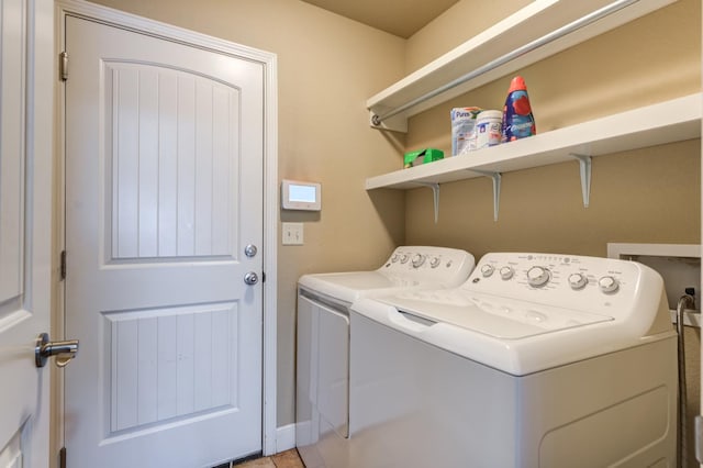 washroom featuring independent washer and dryer