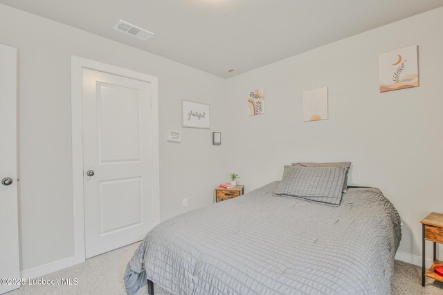2927 Abbeville Ave, Wolfforth, TX 79382 - bedroom with baseboards and light colored carpet