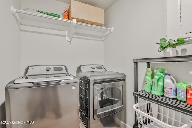 2927 Abbeville Ave, Wolfforth, TX 79382 - washroom featuring washing machine and clothes dryer