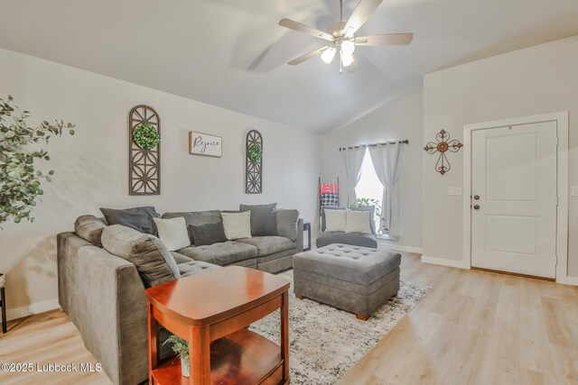 2927 Abbeville Ave, Wolfforth, TX 79382 - living area featuring light wood-style floors, ceiling fan, vaulted ceiling, and baseboards