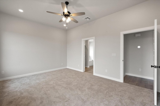 unfurnished bedroom featuring ceiling fan and carpet flooring