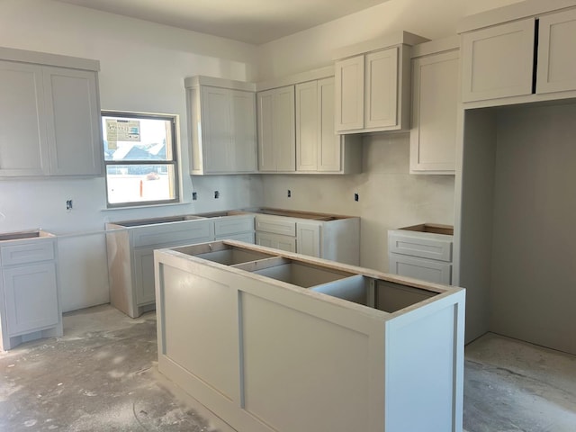 kitchen with sink and a center island