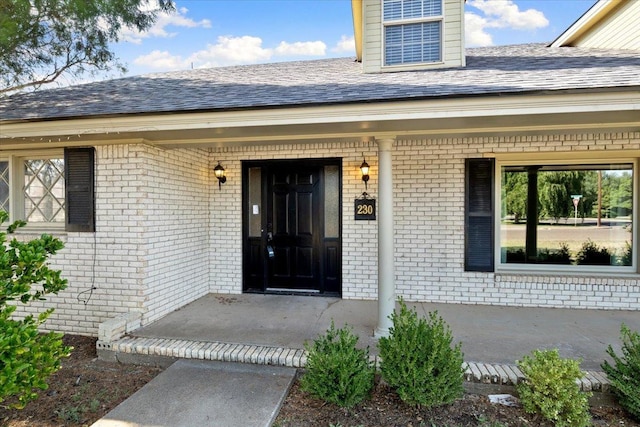 entrance to property with covered porch