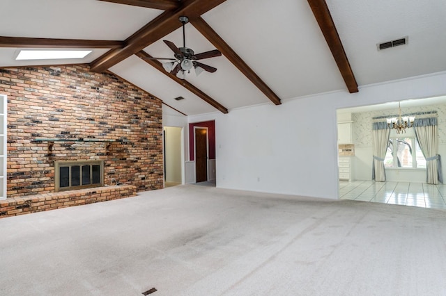 unfurnished living room with high vaulted ceiling, carpet floors, a brick fireplace, ceiling fan with notable chandelier, and beamed ceiling