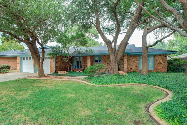 single story home with a garage and a front lawn