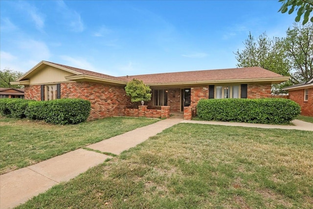 single story home with a front yard