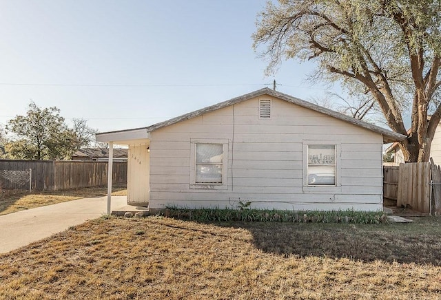 view of home's exterior with a yard