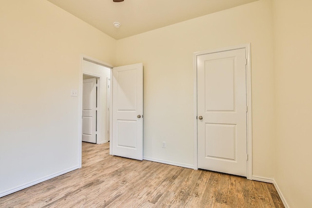 unfurnished bedroom with light hardwood / wood-style flooring