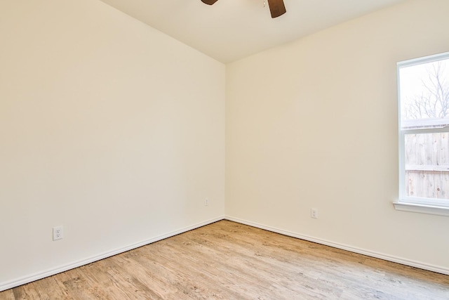 unfurnished room with light hardwood / wood-style flooring and ceiling fan