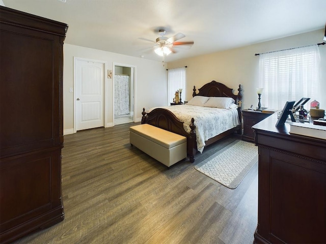 bedroom featuring ceiling fan and dark hardwood / wood-style flooring