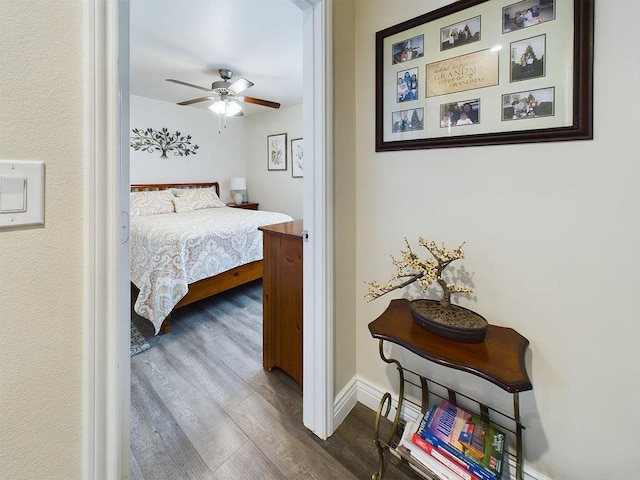 bedroom featuring ceiling fan and wood-type flooring