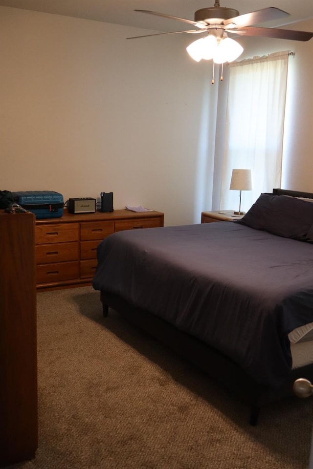 bedroom featuring carpet flooring and ceiling fan