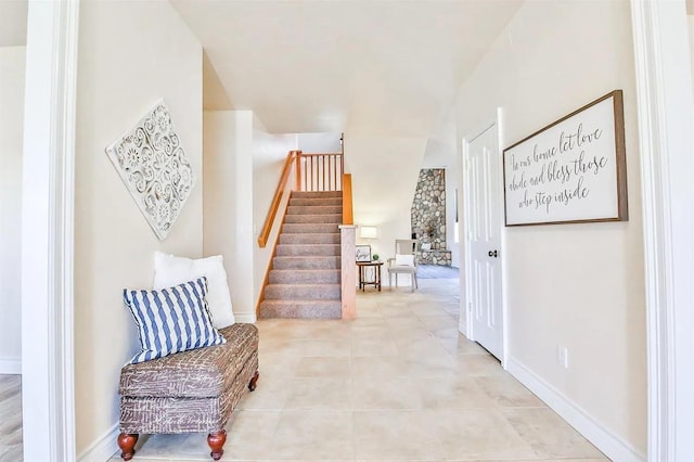 hallway featuring light tile patterned floors