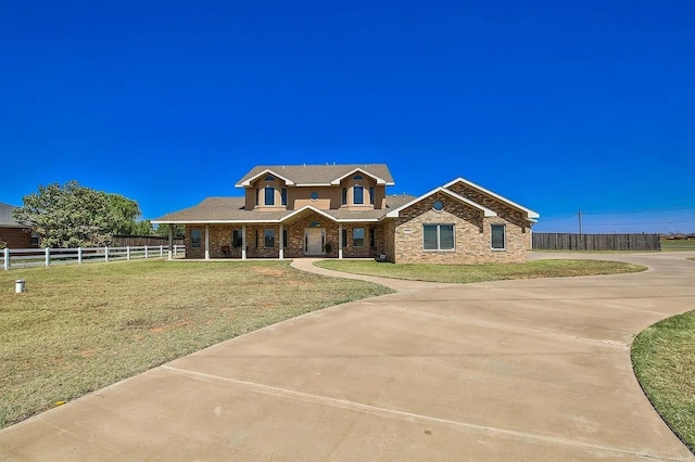 view of front of home with a front yard