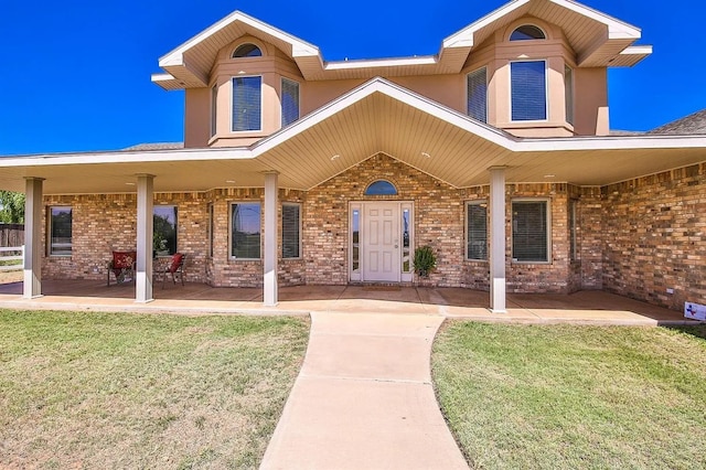 view of front of home with a front lawn