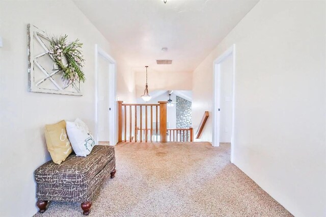 sitting room featuring carpet