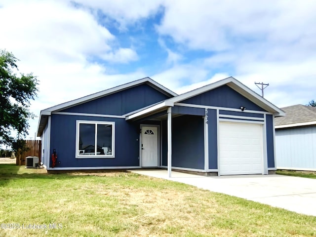 2834 E 7th St, Lubbock, TX 79403 - single story home with an attached garage, driveway, central AC, and a front yard