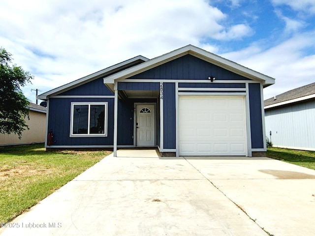 2834 E 7th St, Lubbock, TX 79403 - single story home featuring concrete driveway, an attached garage, and a front yard