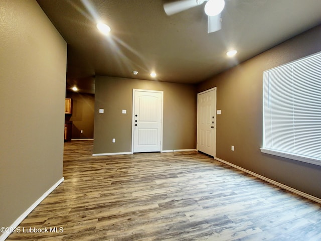 2834 E 7th St, Lubbock, TX 79403 - entryway with wood finished floors, recessed lighting, baseboards, and a ceiling fan
