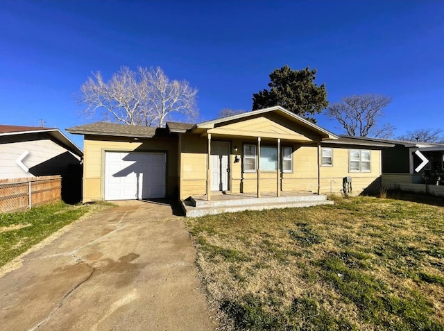 single story home featuring a porch, a garage, and a front lawn