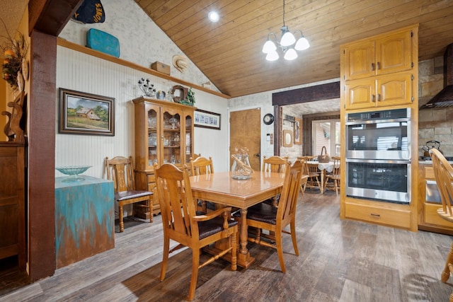 dining area featuring an inviting chandelier, wood ceiling, light hardwood / wood-style flooring, and high vaulted ceiling