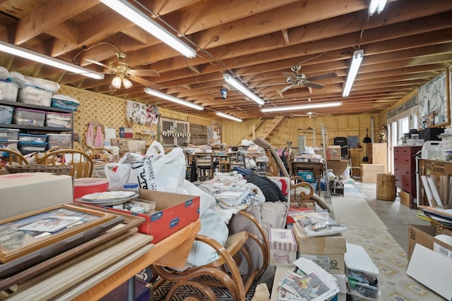 misc room with concrete flooring and ceiling fan