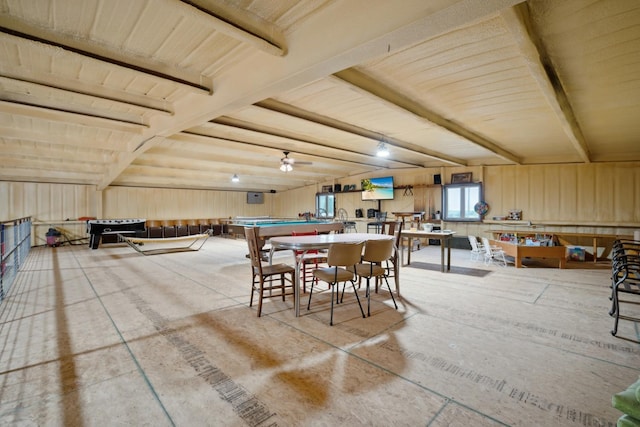 dining room featuring beamed ceiling