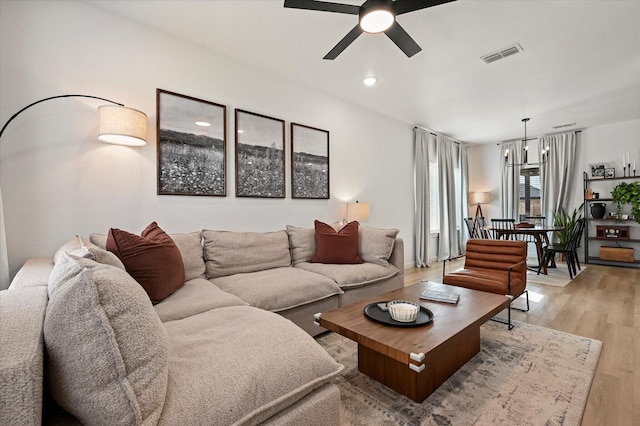 6937 12th St, Lubbock, TX 79416 - living room with light wood-style flooring, visible vents, recessed lighting, and a ceiling fan