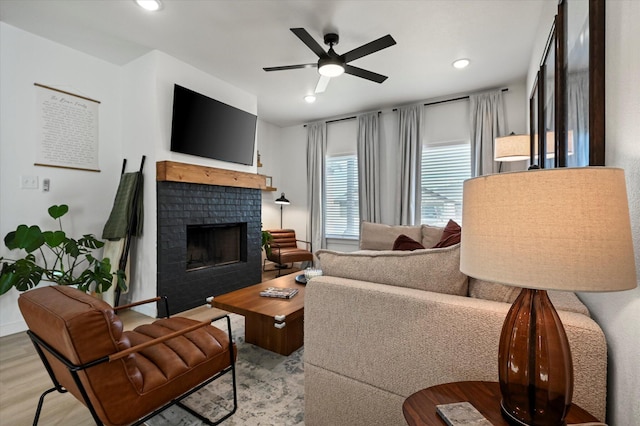 6937 12th St, Lubbock, TX 79416 - living area with a ceiling fan, recessed lighting, a fireplace, and wood finished floors