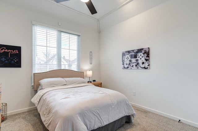 bedroom featuring ceiling fan and light colored carpet