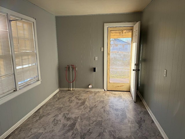 doorway with wooden walls