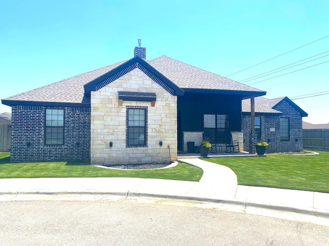 view of front of home with a front lawn