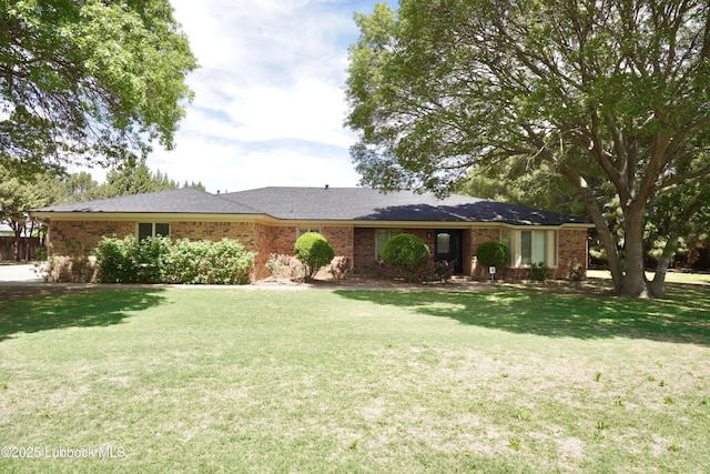 5810 116th St, Lubbock, TX 79424 - ranch-style house with a front lawn and brick siding