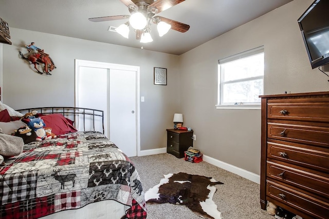 5810 116th St, Lubbock, TX 79424 - carpeted bedroom with baseboards, a closet, and ceiling fan