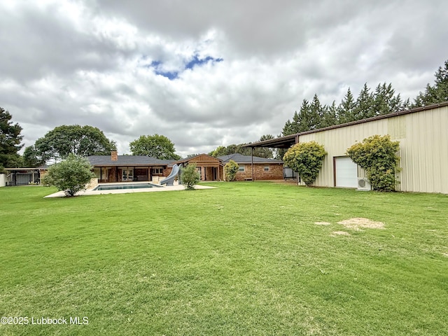 5810 116th St, Lubbock, TX 79424 - view of yard with an outdoor pool