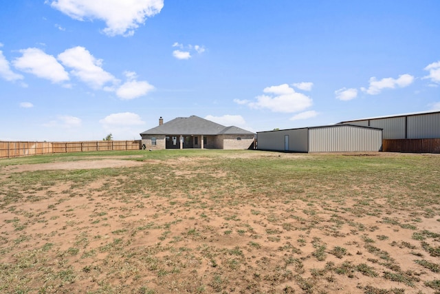 2007 County Rd 7560, Lubbock, TX 79423 - view of yard featuring a pole building and an outbuilding